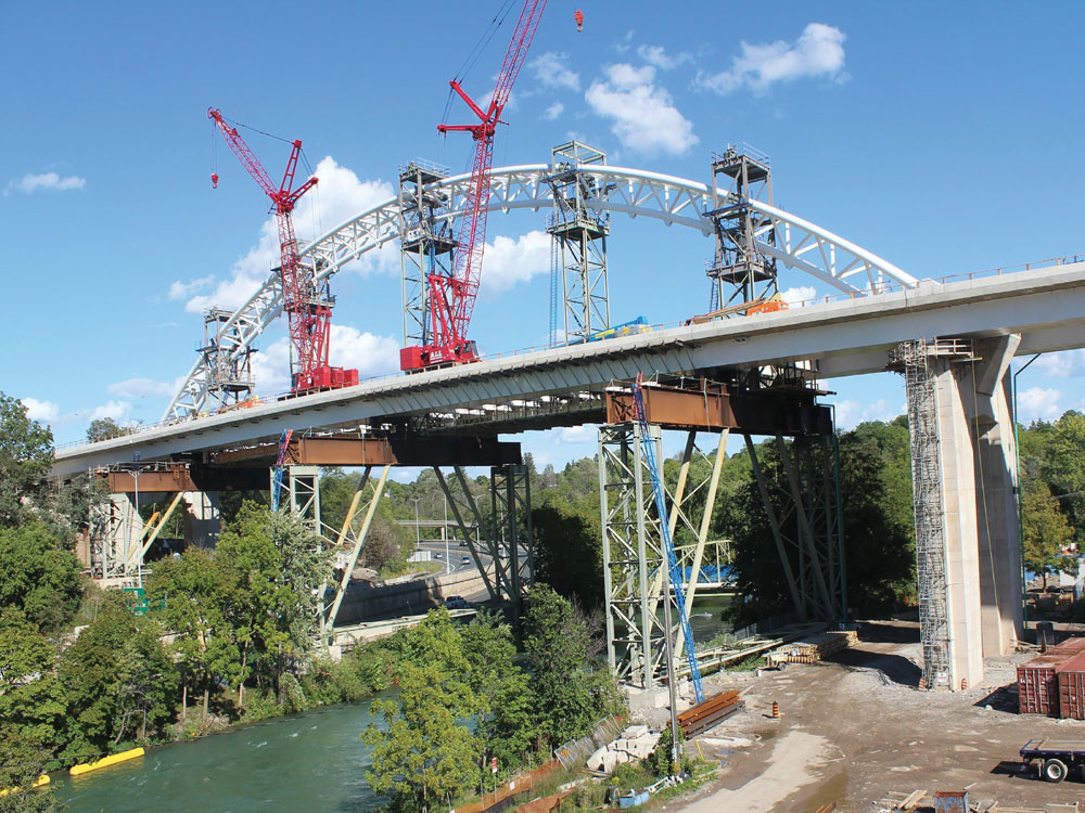Walters Inc. worked to replace an old trestle bridge in St. Catharines, Ontario with a striking new arched bridge. The constraints of the valley and the existing roads ruled out conventional construction, leading to a more challenging, creative approach t